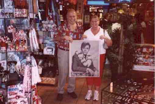 Gene
Gelfo, the President of King's Village and Linda Smith with the Jack Lord poster